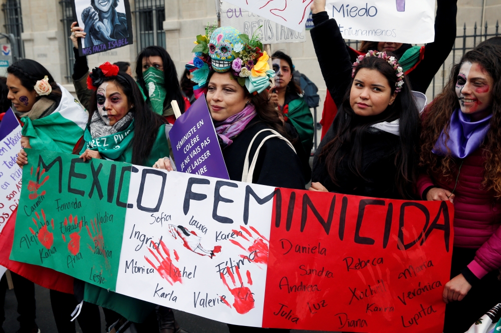 Mexican women protest against femicide in Mexico, during a protest demanding equality on International Women's Day in Paris, France, March 8, 2020. Reuters/Pascal Rossignol
 
