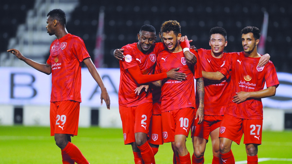 Al Duhail’s Brazilian striker Paulo Edmilson (second left) celebrates with team-mates after scoring a goal against Al Sailiya yesterday.