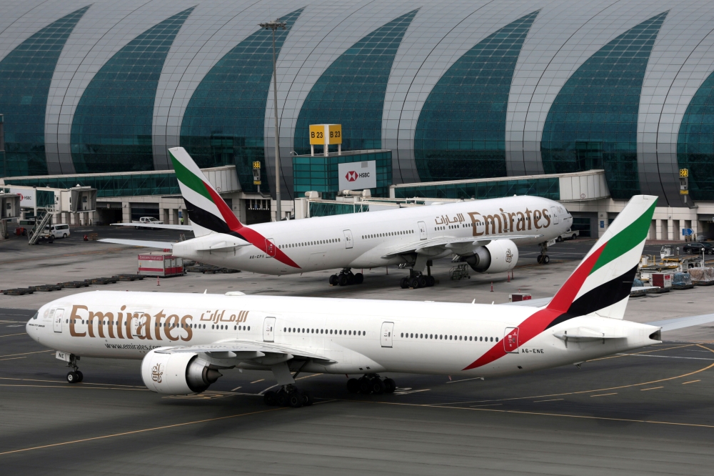 Emirates Boeing 777-300ER planes at Dubai International Airport in Dubai, United Arab Emirates, February 15, 2019. Reuters/Christopher Pike