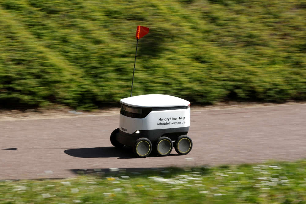 A delivery robot from the company ''Starship'' is seen, as the spread of the coronavirus disease (COVID-19) continues, in Milton Keynes, Britain, April 21, 2020. REUTERS/Andrew Boyers