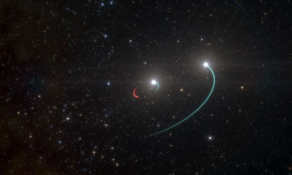 A handout photo made available by the European Southern Observatory on May 4, 2020 shows an artist's impression of the orbits of the objects in the HR 6819 triple system. AFP PHOTO /L. Calcada/European Southern Observatory