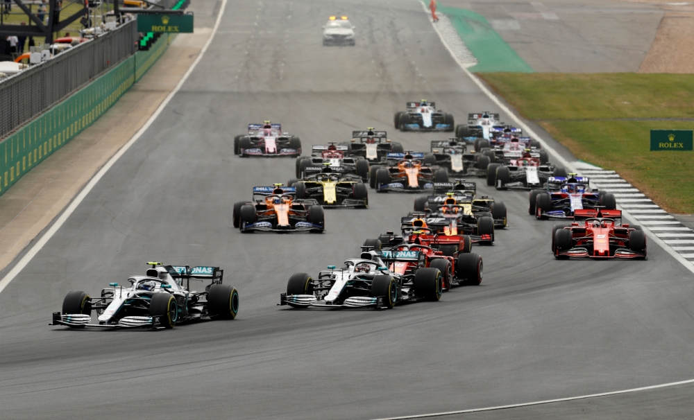 Mercedes' Valtteri Bottas leads Mercedes' Lewis Hamilton at the first corner of the race REUTERS/John Sibley/File Photo