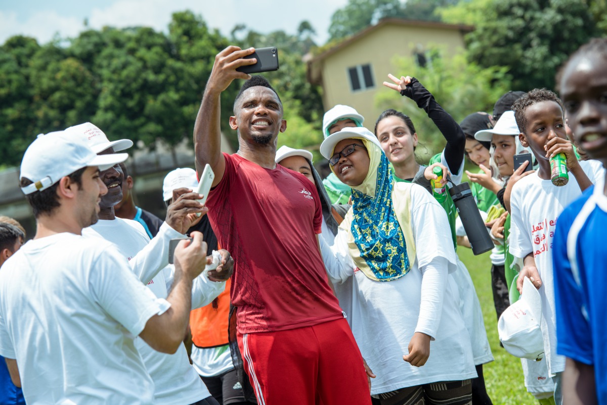 Former Cameroonian star and Global Ambassador for SC Samuel Eto'o with fans during Generation Amazing Programme.   