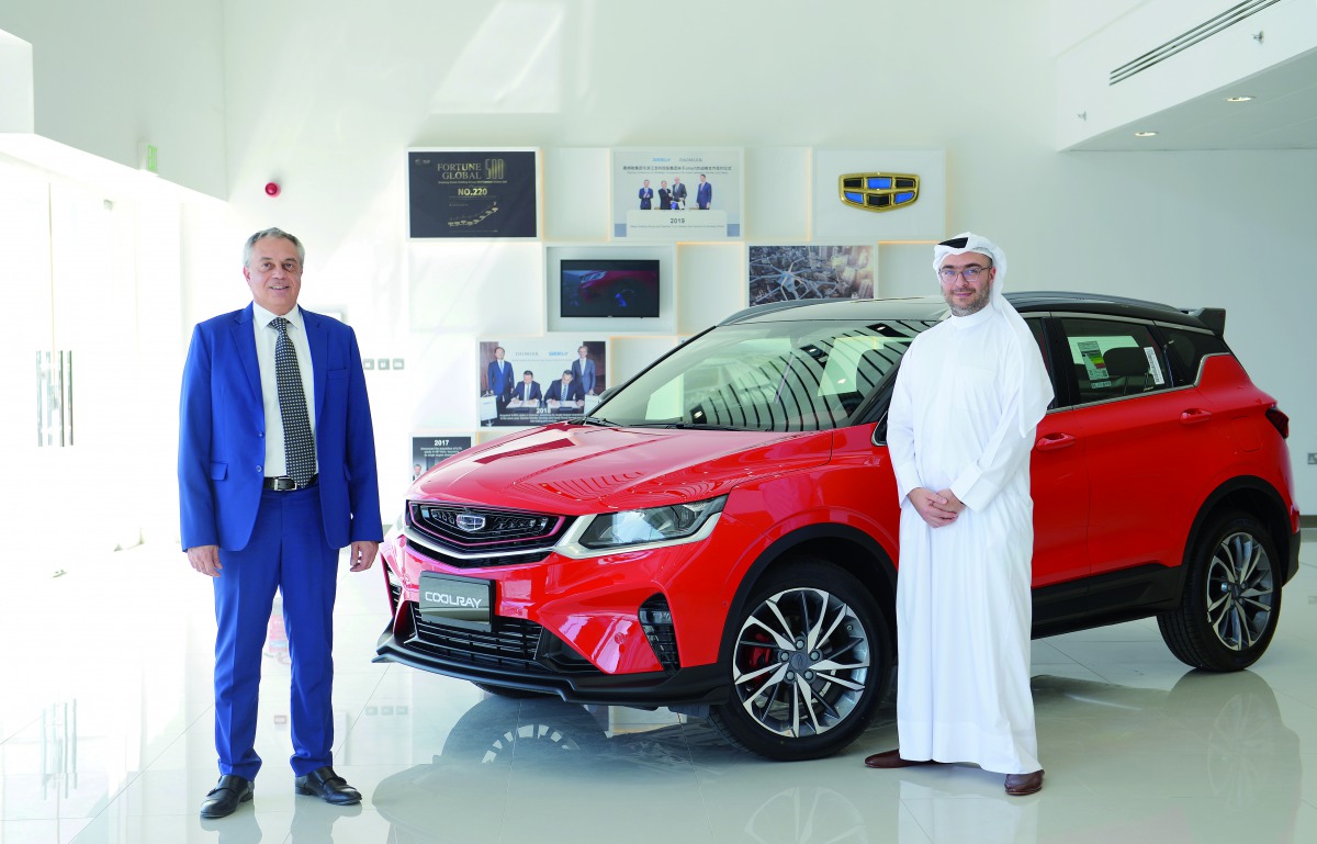 The officials during the opening ceremony of Geely Auto showroom.