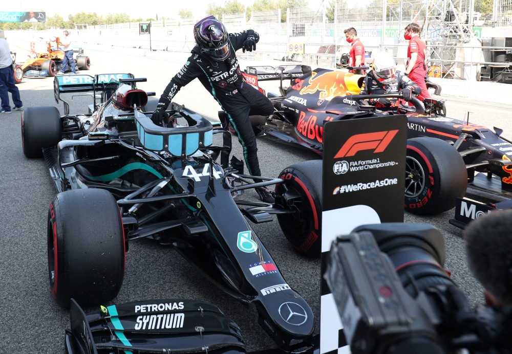 Mercedes' Lewis Hamilton gets out the car after qualifying in pole position REUTERS/Albert Gea/Pool

