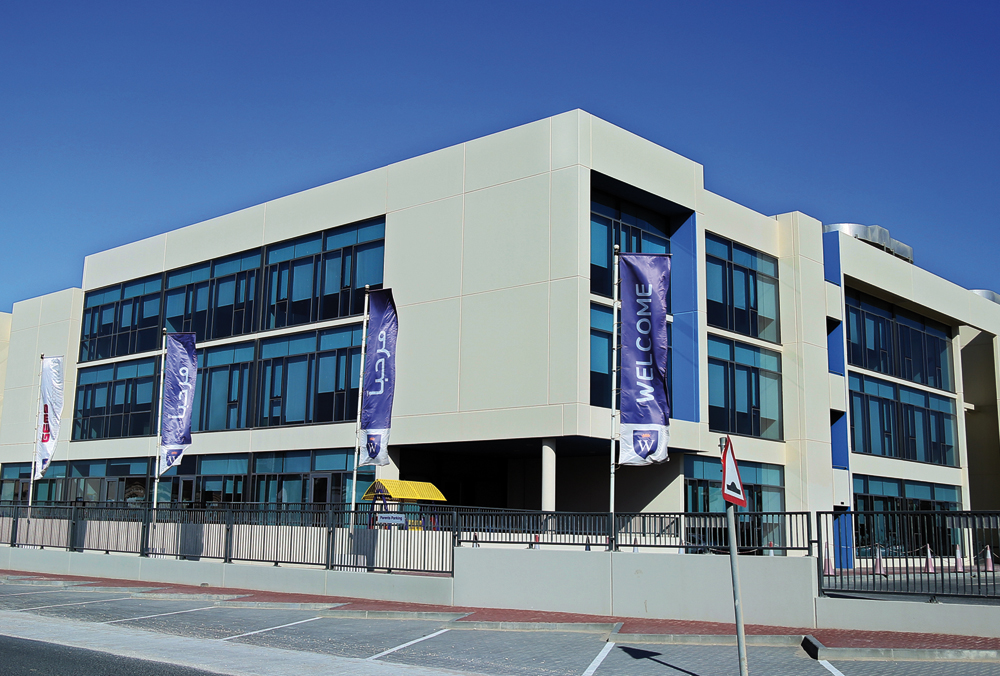 A provided picture of Wellington School building funded by The First Investor (TFI) Qatar, a leading Shariah-complaint investment arm of Barwa Bank. 
