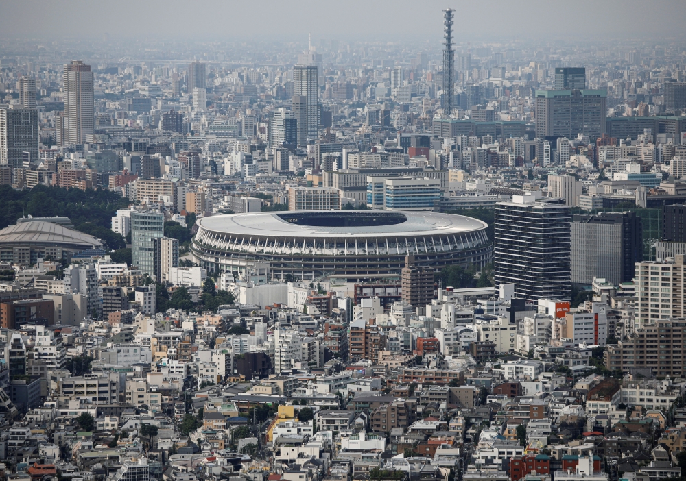 The National Stadium, the main stadium of Tokyo 2020 Olympics and Paralympics, is seen from an observation desk in Tokyo, Japan July 20, 2020. REUTERS/Issei Kato/File Photo