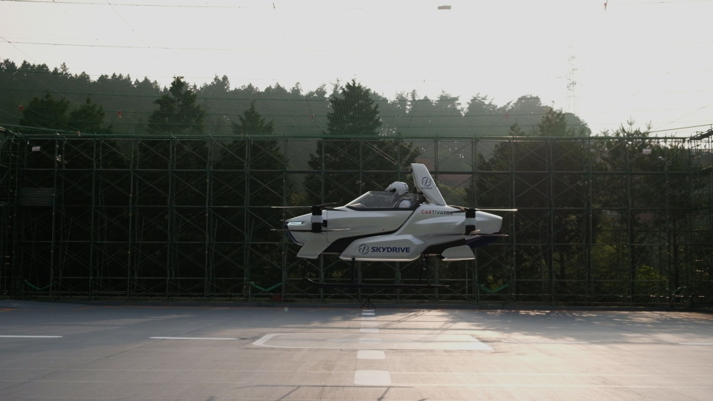 This handout picture taken in August 2020 obtained on September 2, 2020 from SkyDrive/CARTIVATOR shows the SD-03 manned flying car during a test flight at Toyota test field in Toyota city, Aichi prefecture. 