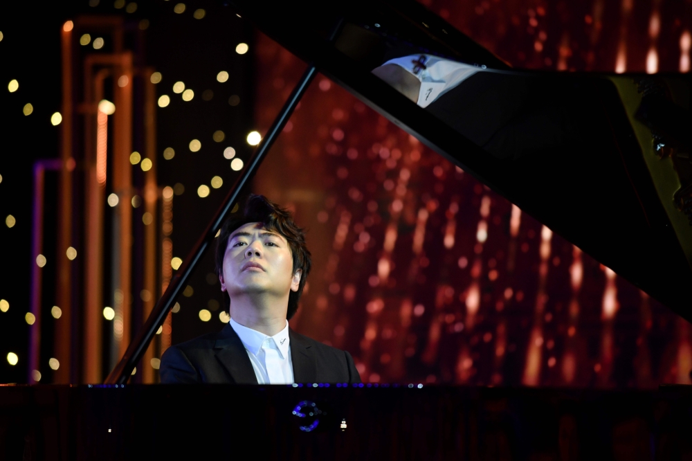 Chinese pianist Lang Lang performs during a ceremony marking the release of his new album of studio recordings and live performances of Johann Sebastian Bach's Goldberg Variations, in Beijing on September 4, 2020. AFP / GREG BAKER