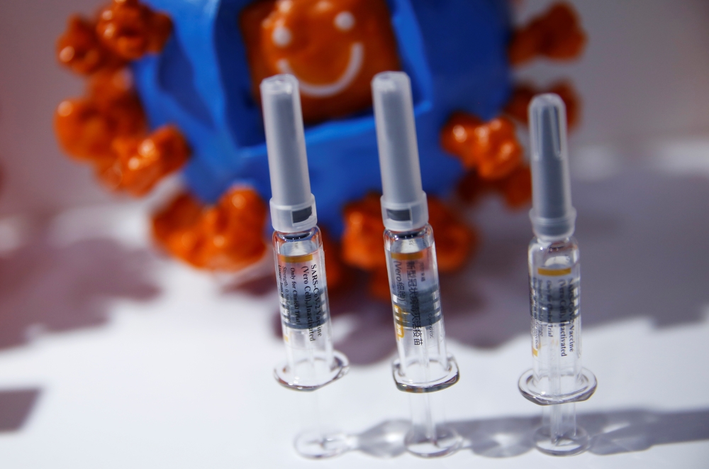 A booth displaying a coronavirus vaccine candidate from Sinovac Biotech Ltd is seen at the 2020 China International Fair for Trade in Services (CIFTIS), following the COVID-19 outbreak, in Beijing, China September 5, 2020. REUTERS/Tingshu Wang
