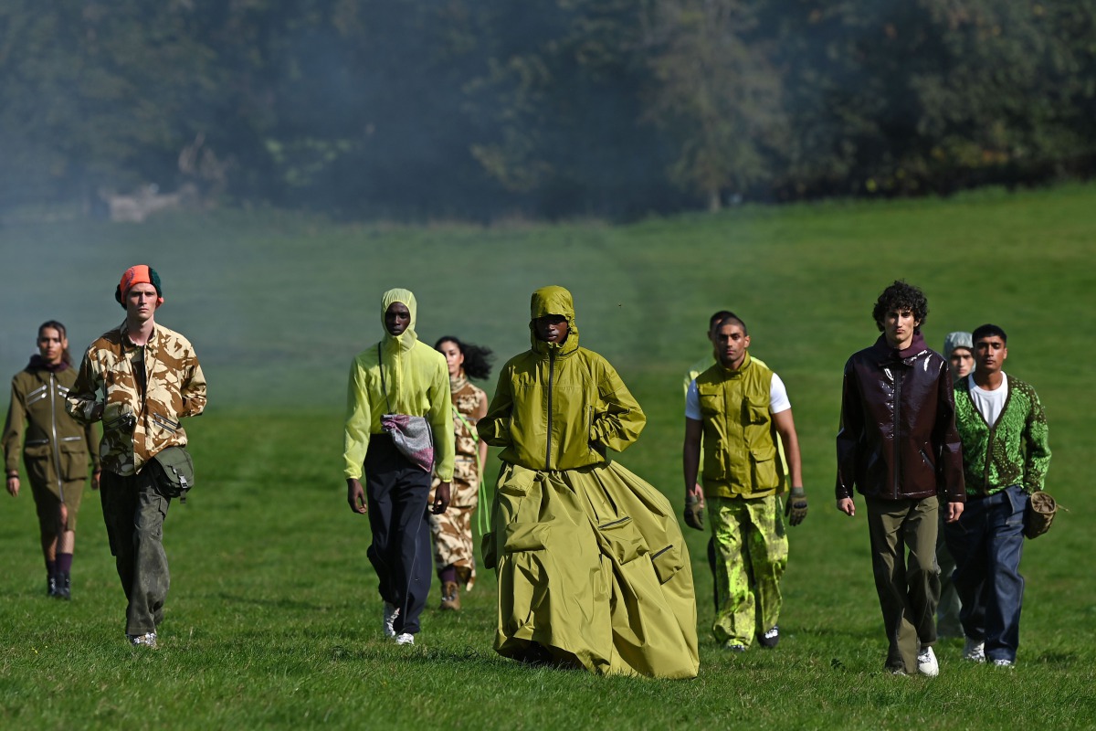 Models present creations from London-based designer Paria Farzaneh during a presentation for her Spring/Summer 2021 collection, during London Fashion Week in Amersham, north-west of London, on September 20, 2020. / AFP / Ben STANSALL
