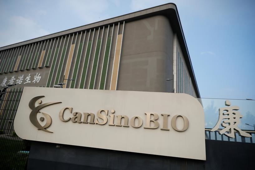 FILE PHOTO: A logo of China's vaccine specialist CanSino Biologics Inc is pictured on the company's headquarters in Tianjin, following an outbreak of the coronavirus disease (COVID-19), China August 17, 2020. REUTERS/Thomas Peter