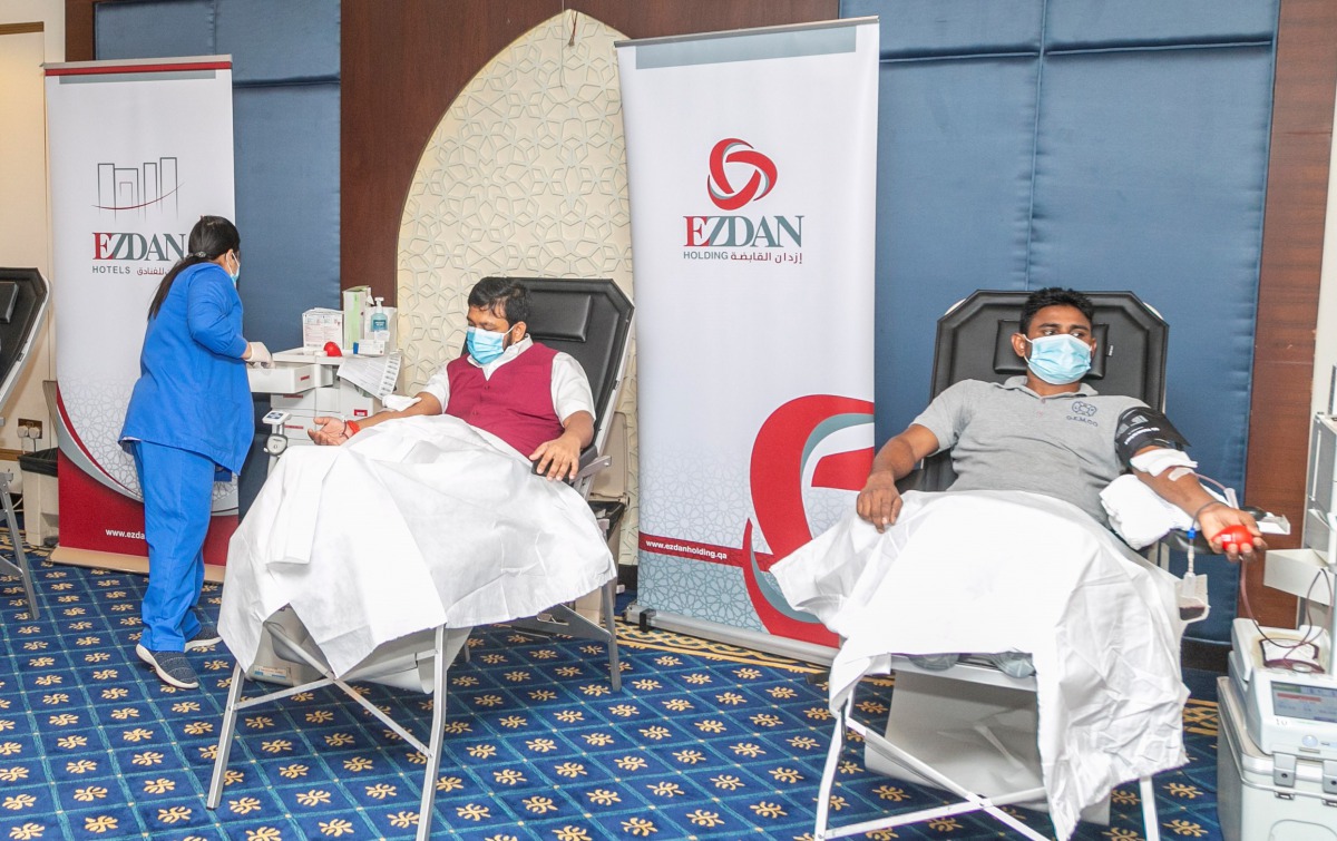 Employees of Ezdan Hotel donating blood during the campaign.