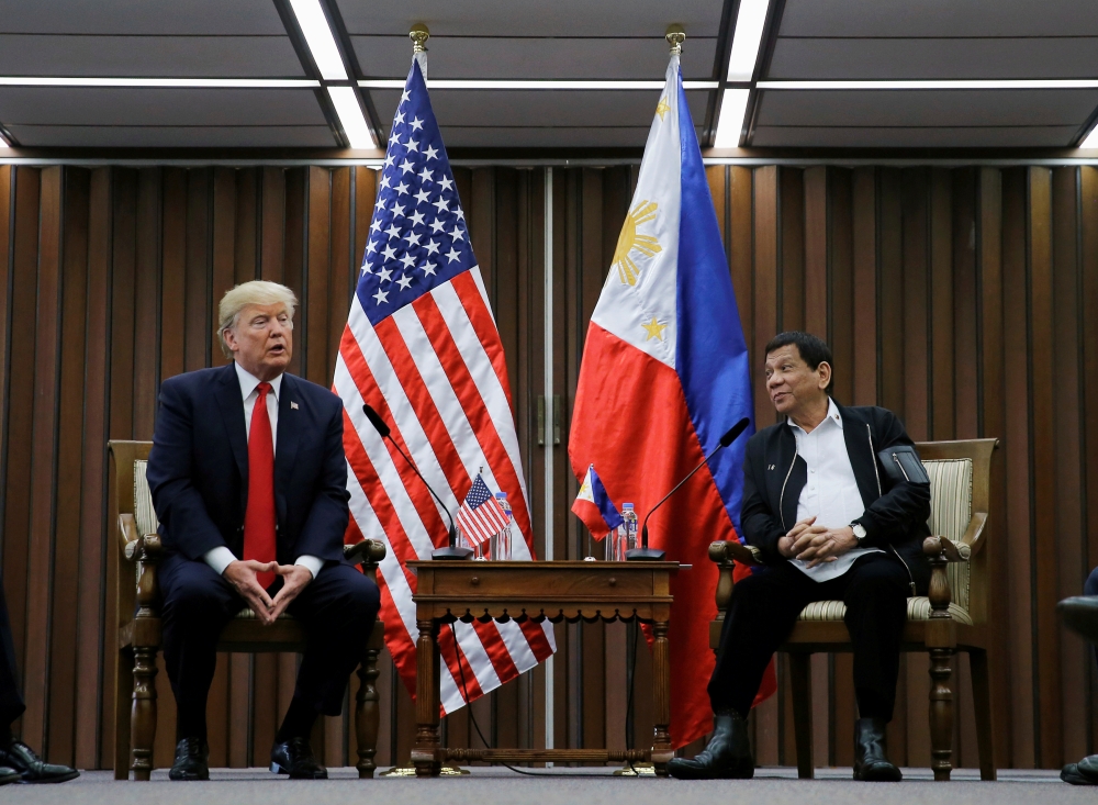 FILE PHOTO: U.S. President Donald Trump holds a bilateral meeting with President of the Philippines Rodrigo Duterte alongside the ASEAN Summit in Manila, Philippines November 13, 2017. REUTERS/Jonathan Ernst/File Photo