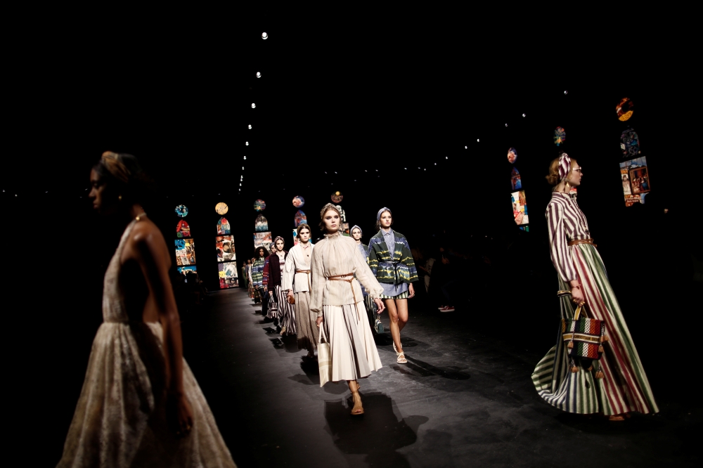 Models present creations by designer Maria Grazia Chiuri as part of her Spring/Summer 2021 ready-to-wear collection show for fashion house Dior during Paris Fashion Week in Paris, France, September 29, 2020. REUTERS/Benoit Tessier
