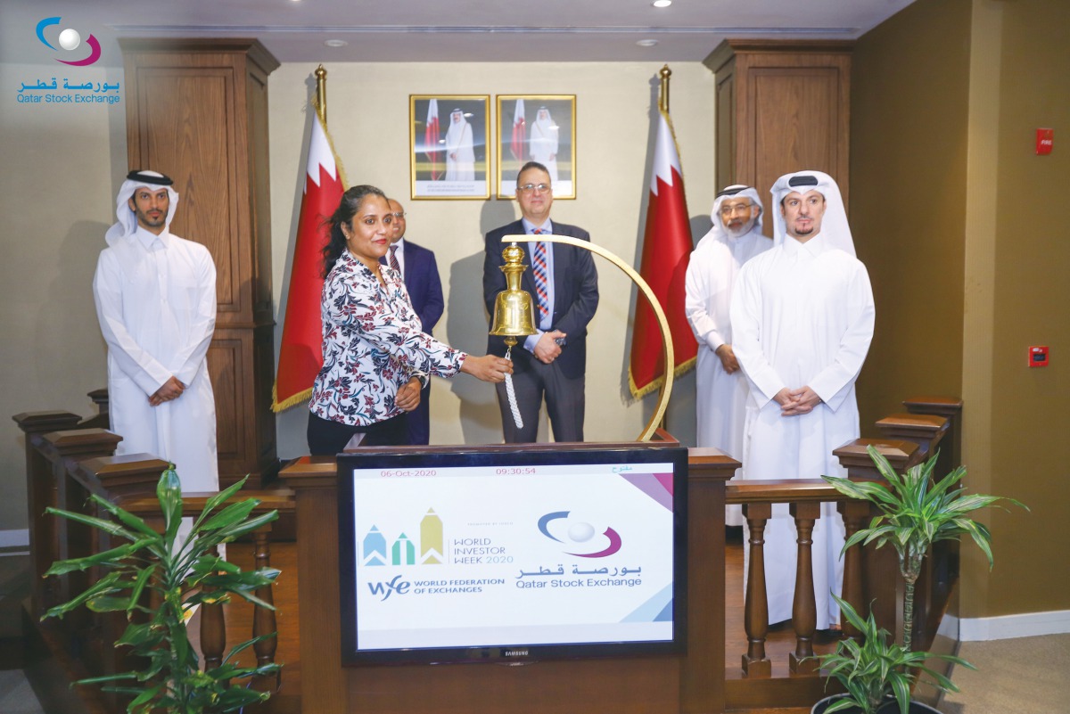 Senior officials of Qatar Stock Exchange (QSE) and others at the bell ringing ceremony hosted as part of its participation in the World Investor Week initiated by IOSCO and the World Federation of Exchanges, at the QSE headquarters, yesterday. 