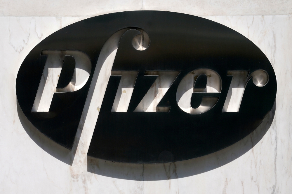 A sign is pictured outside Pfizer Headquarters in the Manhattan borough of New York City, New York, U.S., July 22, 2020. REUTERS/Carlo Allegri/File Photo/File Photo