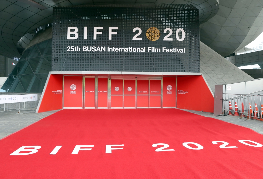 Signs of the Busan International Film Festival are seen at an entrance of the Busan Cinema Center in Busan on October 21, 2020. Asia's biggest annual film festival started in South Korea October 21 at a fraction of its usual scale, but some movie fans wil