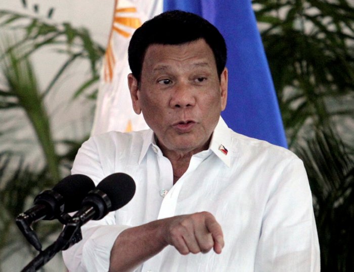 President Rodrigo Duterte speaks after his arrival, from a visit in Israel and Jordan at Davao International airport in Davao City in southern Philippines, September 8, 2018. REUTERS/Lean Daval Jr./File Photo