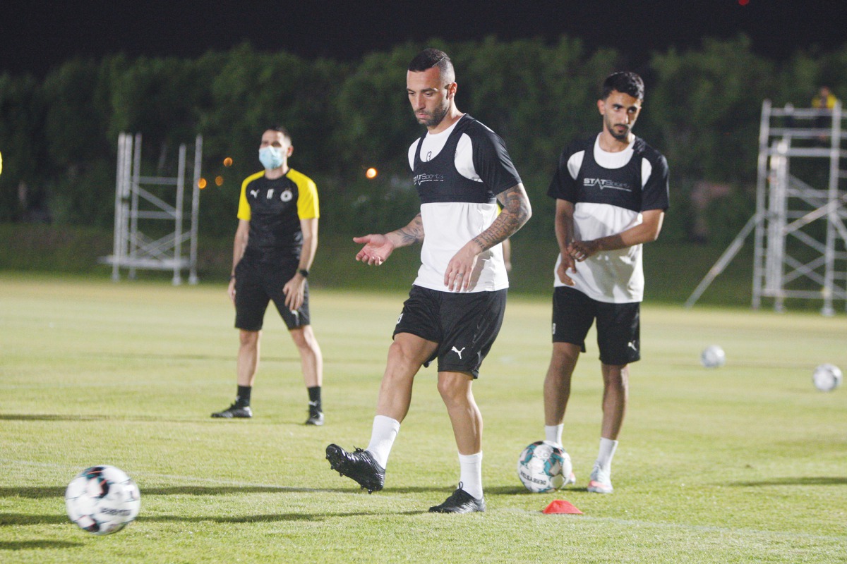 Al Wakrah and Al Sadd players taking part in practice sessions on the eve of their Ooredoo Cup Group A fifth round match which will be played at the Qatar SC Stadium. The match kicks off at 5:15pm. The winners of today's match will top the group. 