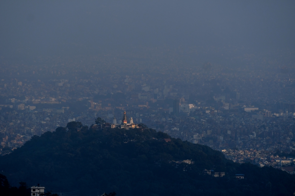 A general view shows the urban area of the Kathmandu Valley with Swayambhunath stupa from Ichangu Narayan village, on the outskirts of Kathmandu on November 9, 2020. AFP / Prakash Mathema 