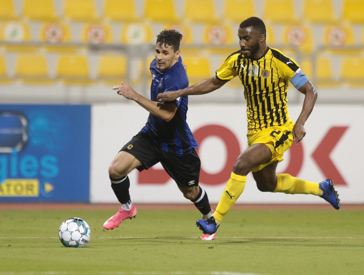 Action from fifth round match between Qatar SC and Al Sailiya.