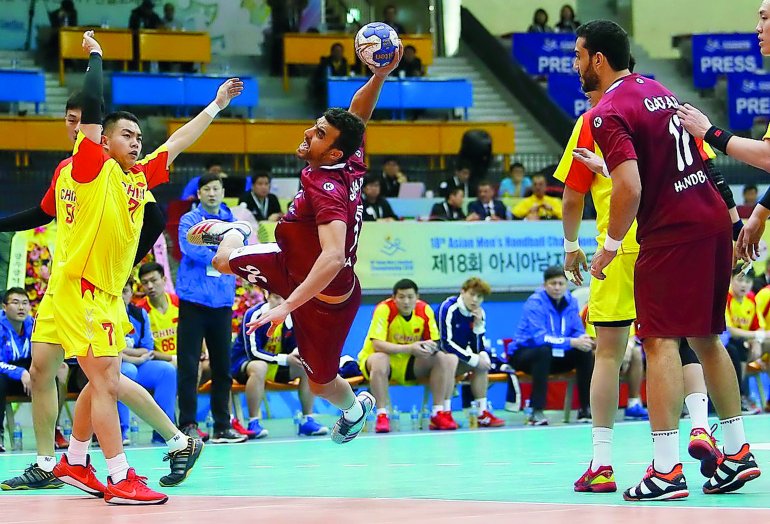A Qatari player shoots at goal during the Asian Handball Championship match against China in Suwon, South Korea in this file photo.