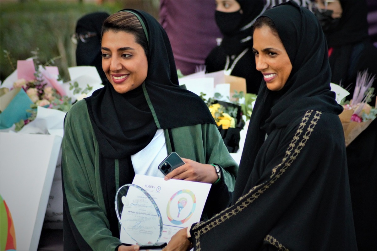 Director Yasmian Events and VIP Padel Qatar Tournament, Yasmine Ghanem Al Sharshani poses for a photo with Fatma, one of the participants at the event. RIGHT: Yasmine Ghanem Al Sharshani with Moza Almouhandi.