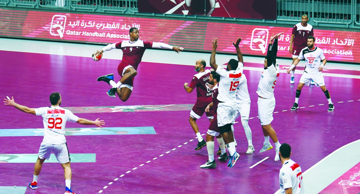 Qatar's Rafael Capote (left) prepares to score against Tunisia during the opening match of the International Friendly Tournament took place at Al Duhail Indoor Stadium yesterday.