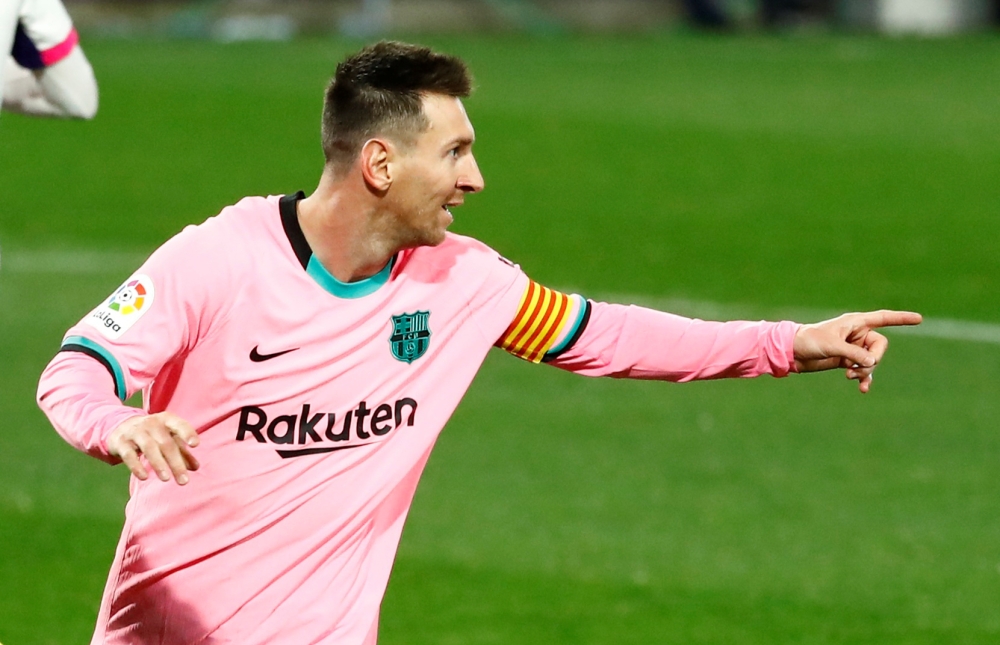 December 22, 2020 Barcelona's Lionel Messi celebrates scoring their third goal REUTERS/Juan Medina/File Photo