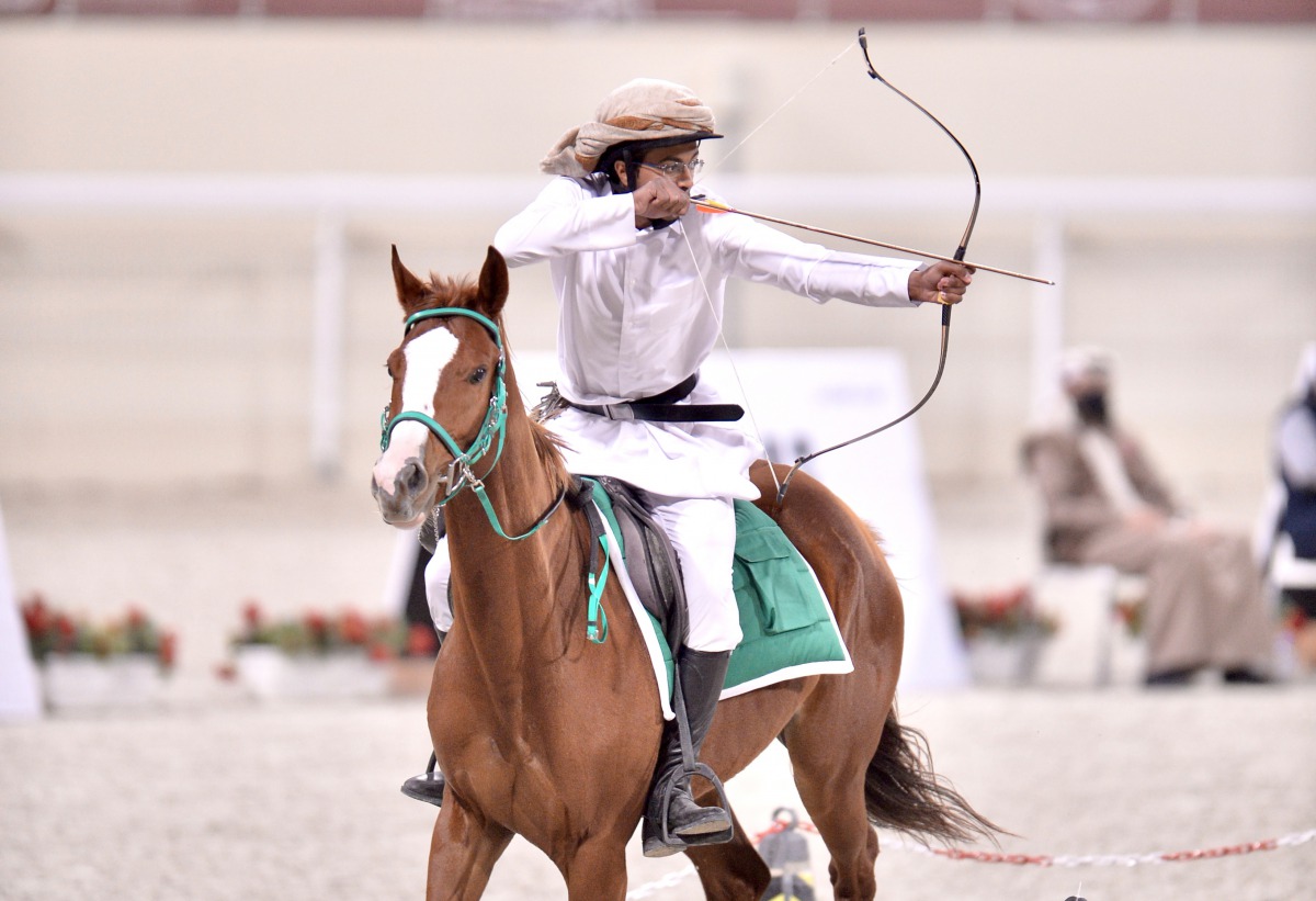 Qatari archer Badr Mubarak Al Marri in action during the first horseback shooting competition (Al Nashaab Championship) organised by the Qatar Equestrian Federation and Modern Pentathlon. The event was organised in cooperation with the Horseback Archery S