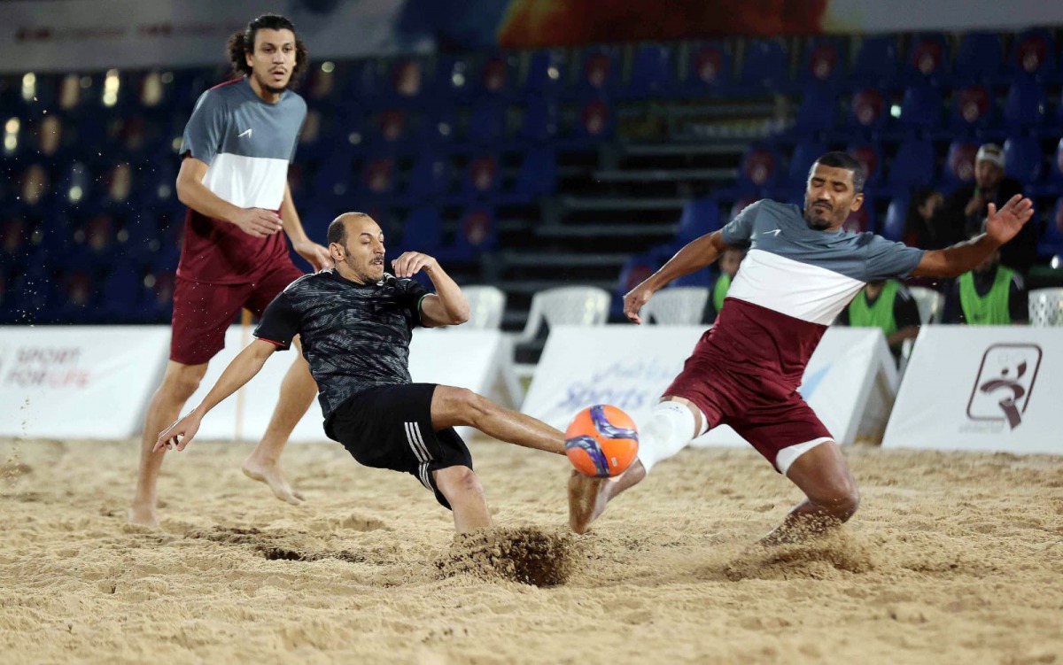 Action during the semi-finals of the beach football tournament of the Qatar Olympic Committee Beach Games at Aspire Zone yesterday.