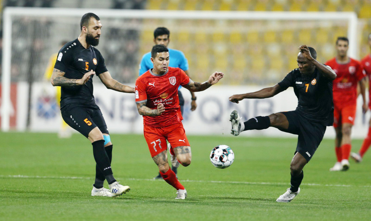 Al Duhail's Eduardo Rodriguez vying for the ball with Umm Salal players during their QNB Stars League Round 12 match played at Qatar SC Stadium, yesterday. 