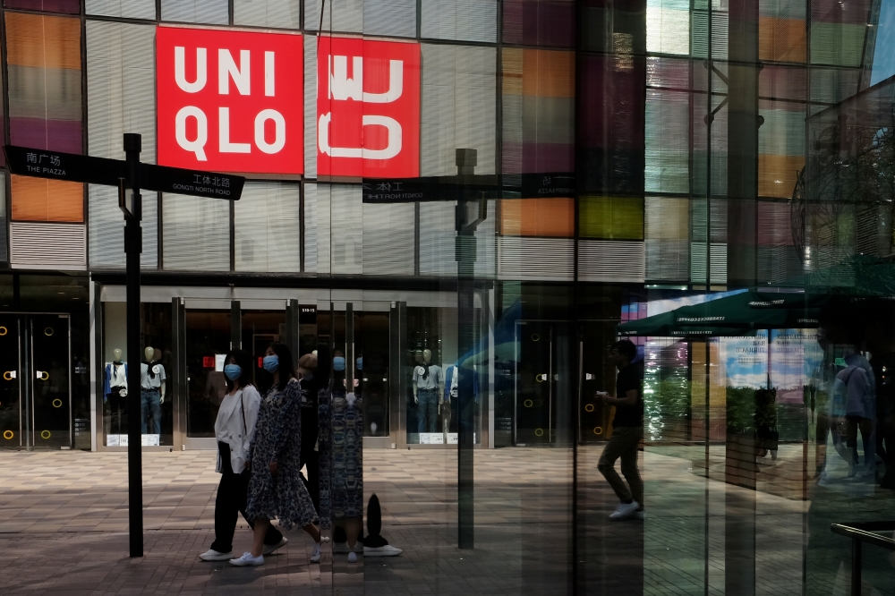 Fast Retailing's fashion chain Uniqlo, at a shopping complex in Beijing, China May 24, 2020. REUTERS/Florence Lo/File Photo