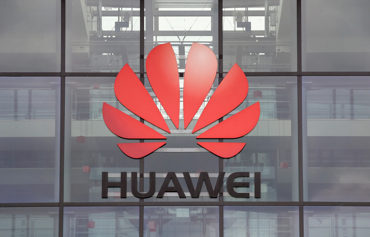 FILE PHOTO: Huawei logo is pictured on the headquarters building in Reading, Britain July 14, 2020. REUTERS/Matthew Childs/File Photo
