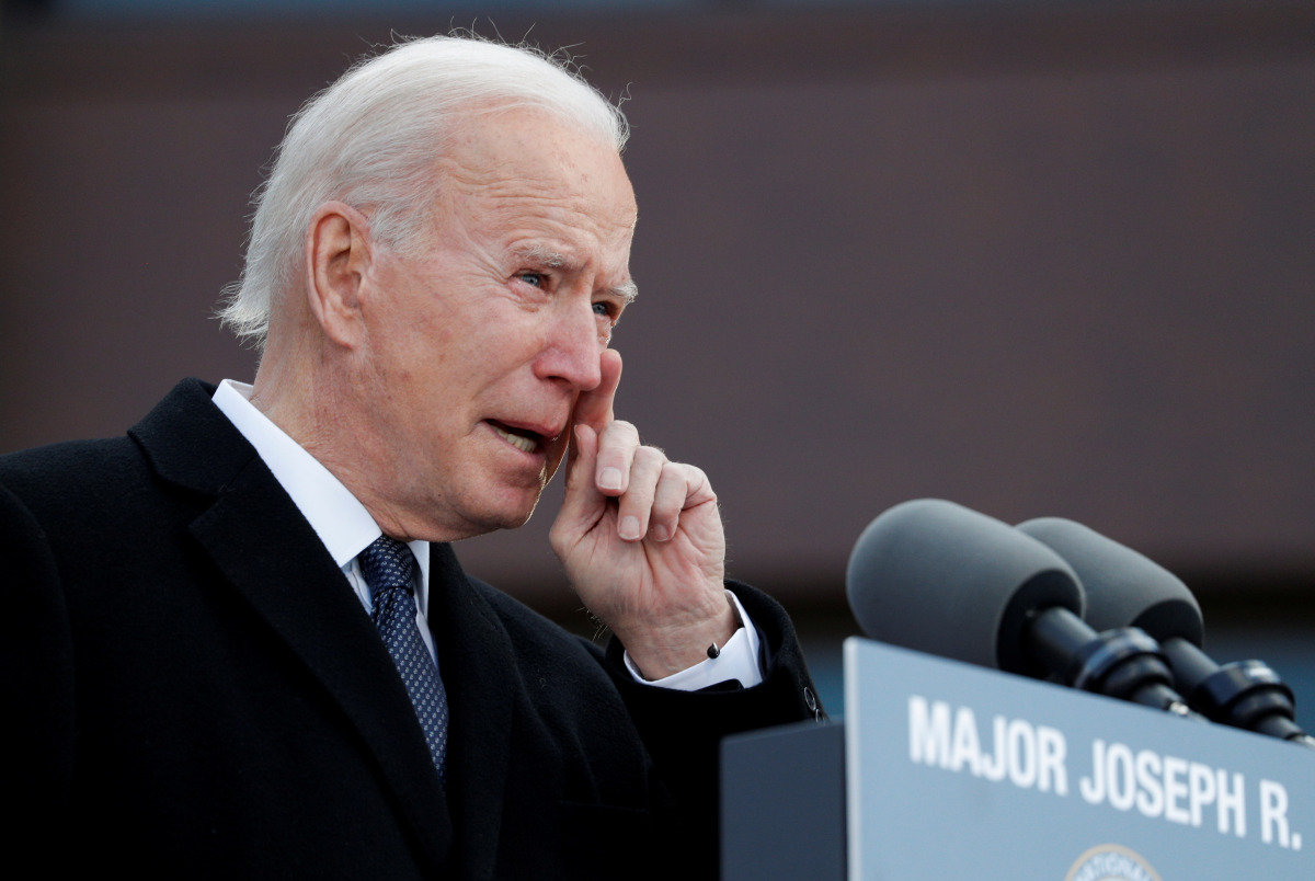 U.S. President-elect Joe Biden cries during an event at Major Joseph R. 