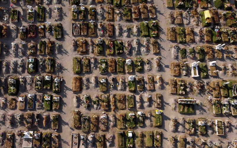 Graves are seen at the Xico cemetery, as the coronavirus disease (COVID-19) outbreak continues, in Valle de Chalco, in the State of Mexico, Mexico January 22, 2021. Picture taken from a drone REUTERS/Carlos Jasso
