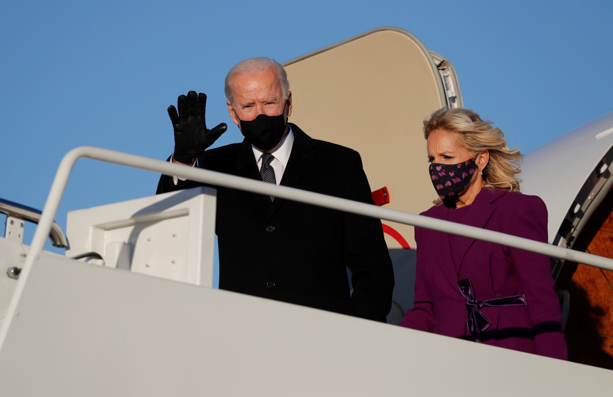 U.S. President-elect Joe Biden and his wife Jill disembark a plane at Joint Base Andrews in Maryland, U.S. January 19, 2021. REUTERS/Tom Brenner
