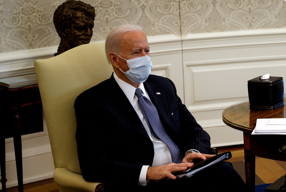US President Joe Biden meets with Democratic senators to discuss efforts to pass coronavirus disease relief legislation in the Oval Office at the White House in Washington, US, February 3, 2021. Reuters/Tom Brenner