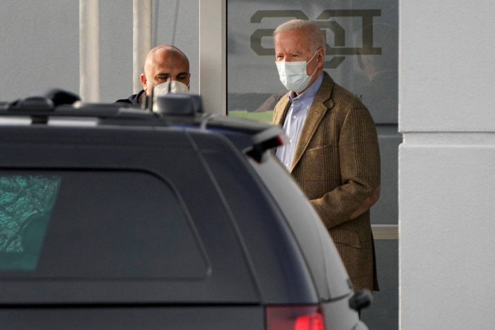 US President Joe Biden leaves from the Delaware Orthopaedic Specialist after a check-up on his foot injury in Newark, Delaware, U.S., February 6, 2021. Reuters/Joshua Roberts