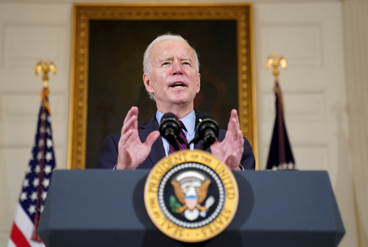 FILE PHOTO: U.S. President Joe Biden delivers remarks on the state of the U.S. economy and the need to pass coronavirus disease (COVID-19) aid legislation during a speech in the State Dining Room at the White House in Washington, U.S., February 5, 2021. R