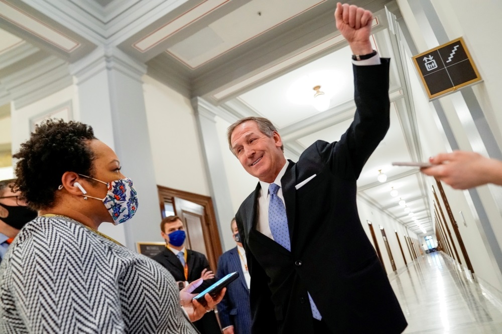 Michael van der Veen, lawyer for former U.S. President Donald Trump, gestures as he talks to a reporter about his participation in a Black Lives Matter protest, after the Senate voted to acquit former President Trump during his impeachment trial in Washin