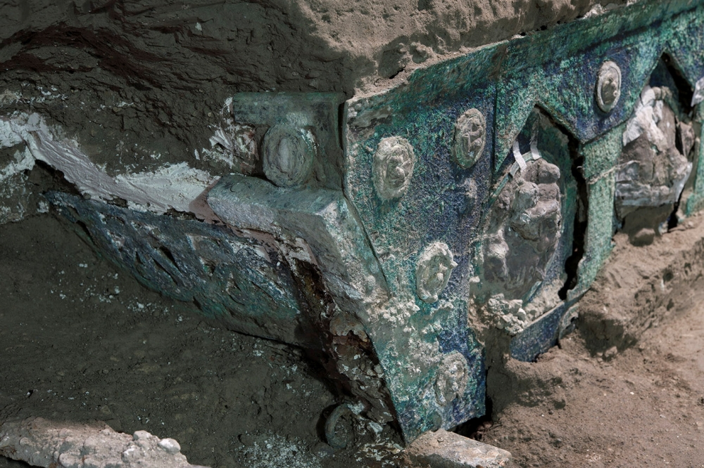 An ancient-Roman ceremonial carriage is discovered in a dig near the ancient Roman city of Pompeii, destroyed in 79 AD in volcanic eruption, Italy, February, 2021. Pompeii Archeological Park/Ministry of Cultural Heritage and Activities and Tourism/Luigi S