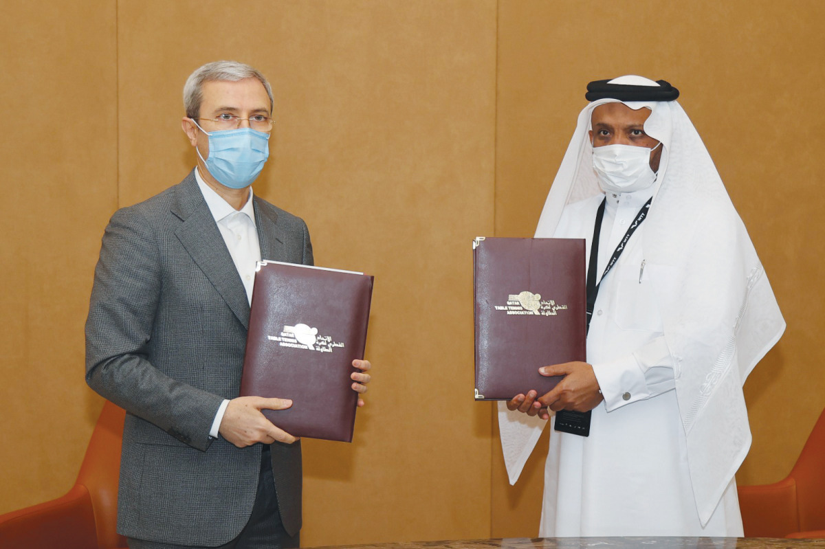 Qatar Table Tennis Federation president Khalil Al Mohannadi and Mehrdad Ali Gardashi, President of the Iranian Table Tennis Federation during the cooperation agreement signing ceremony in Doha yesterday. 