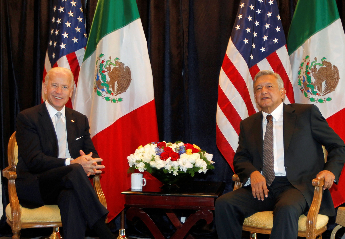 FILE PHOTO: Then-U.S. vice president Joe Biden (L) with Andres Manuel Lopez Obrador, then candidate for president of Mexico, in Mexico City, March 5, 2012. REUTERS/Tomas Bravo/File Photo
