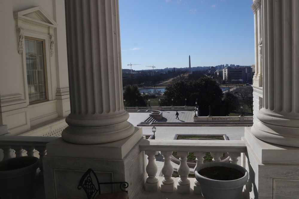 A US Capitol police officer is seen walking on the West side of the US Capitol Building amid heightened security following the assault on the building on January 6 in Washington, US, March 3, 2021. Reuters/Leah Millis