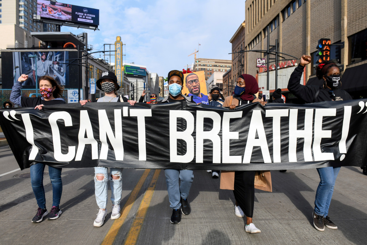 Protesters march through downtown Minneapolis during the 