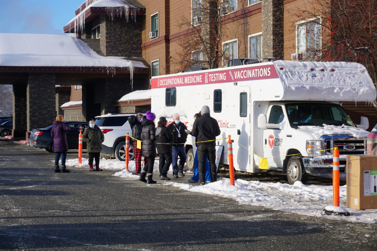 FILE PHOTO: Support workers for the Iditarod Trail Sled Dog Race line up outside the Lakefront ANCHORAGE Hotel, the site of the temporary ANCHORAGE Iditarod headquarters, to be tested for coronavirus (COVID-19), in ANCHORAGE, Alaska, U.S., March 4, 2021. 