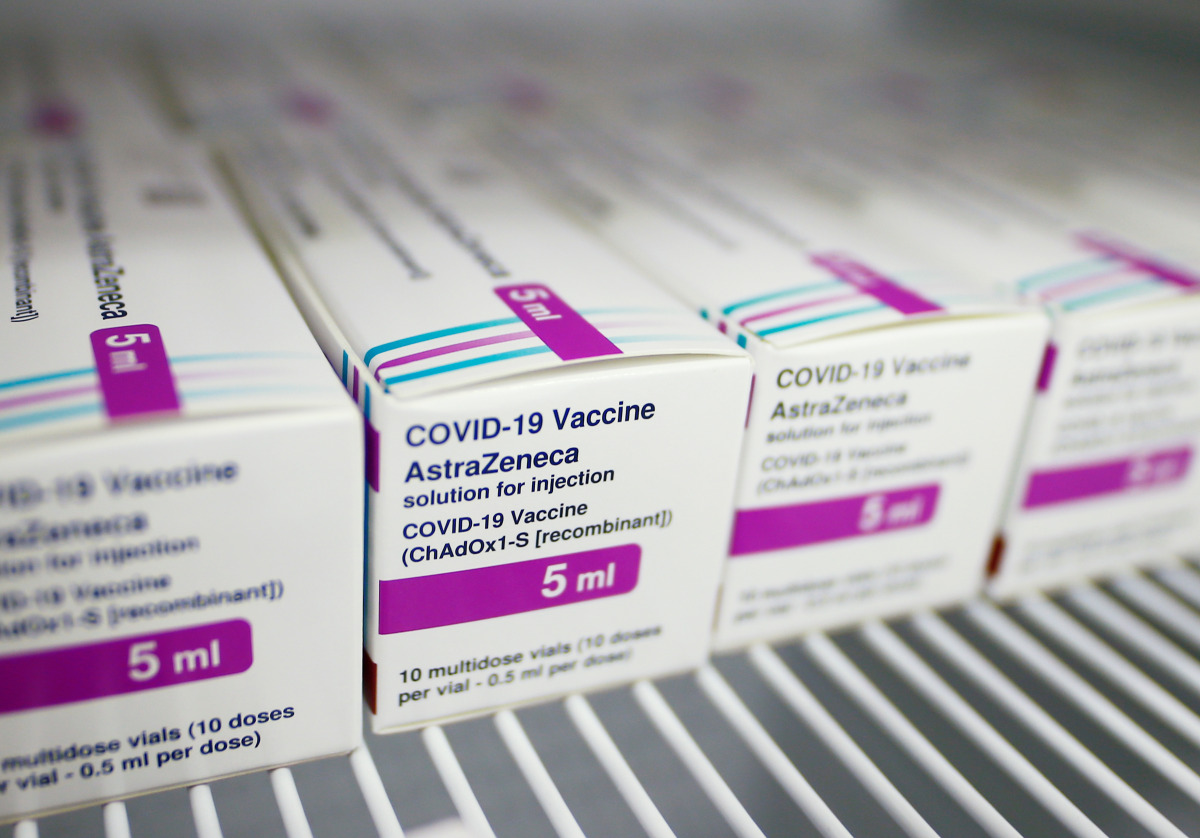 Packages of AstraZeneca's COVID-19 vaccine are seen at a vaccination centre, temporarily set up in a hall of the fair, amid the coronavirus disease pandemic in Cologne, Germany, March 18, 2021. REUTERS/Thilo Schmuelgen

