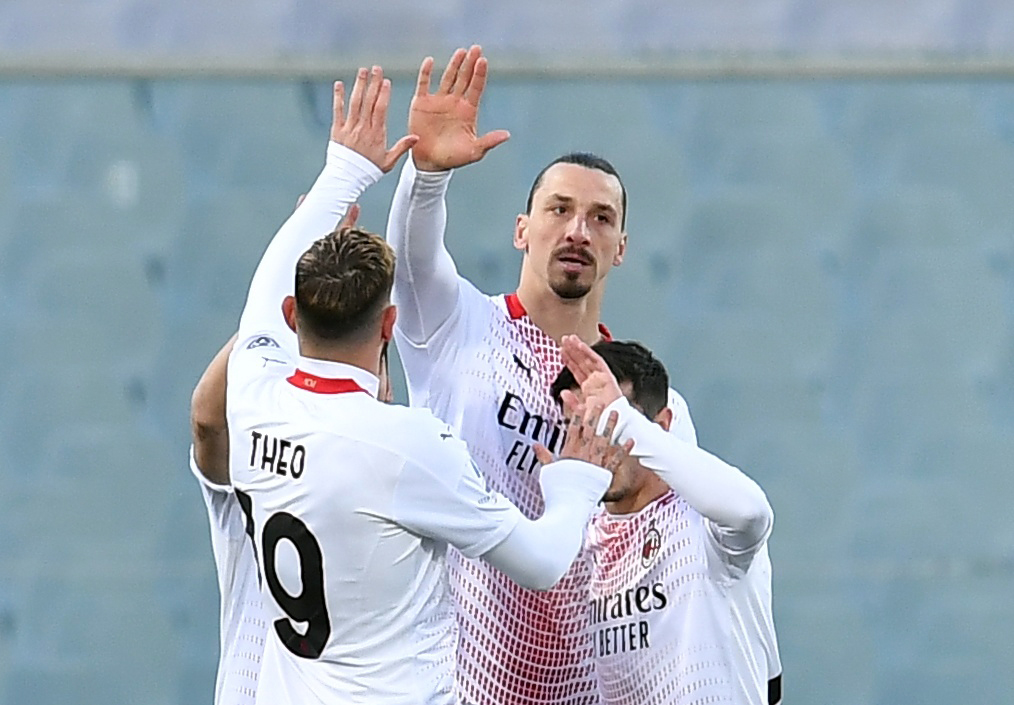 Soccer Football - Serie A - Fiorentina v AC Milan - Stadio Artemio Franchi, Florence, Italy - March 21, 2021 AC Milan's Zlatan Ibrahimovic celebrates scoring their first goal with Theo Hernandez REUTERS/Jennifer Lorenzini
